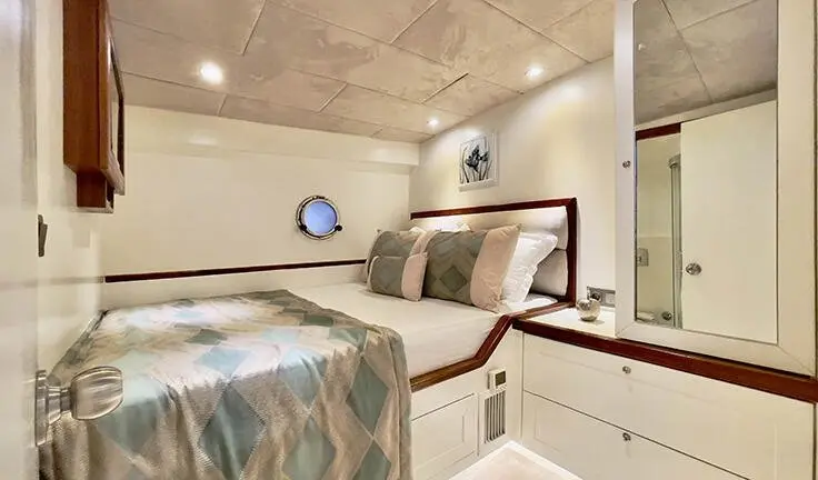 Derya Deniz cabin with double bed, ensuite head, cabin wall decor visible