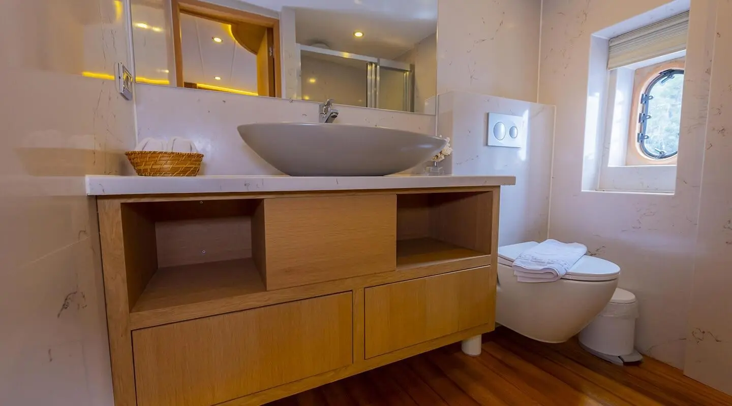 Luxurious yacht Simay M interior with wooden cabinets and modern sink area