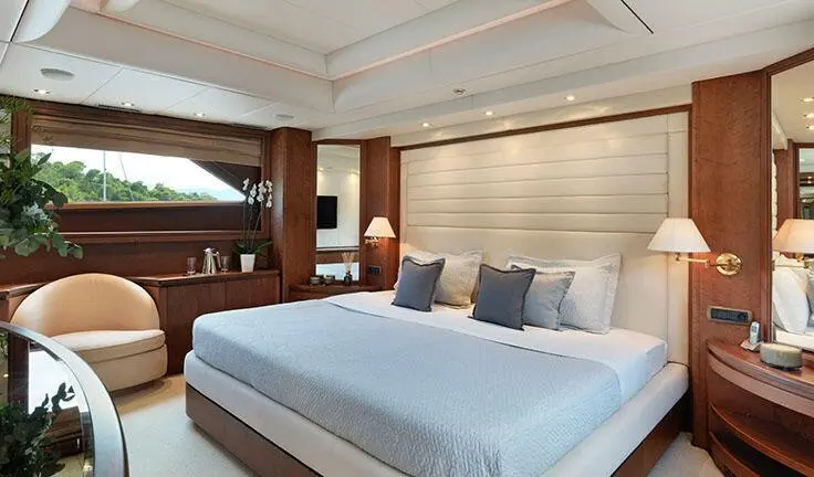 Idylle yacht master cabin with king bed and airy ensuite styling