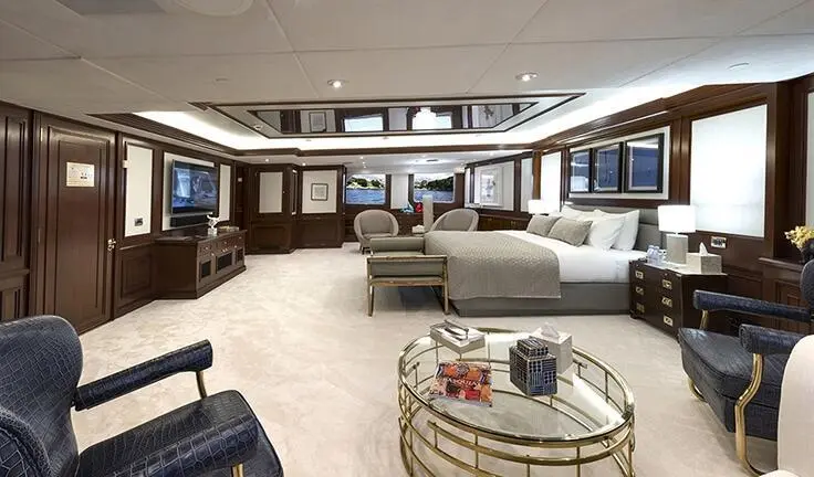 Master cabin with king bed and ensuite on Chakra yacht interior