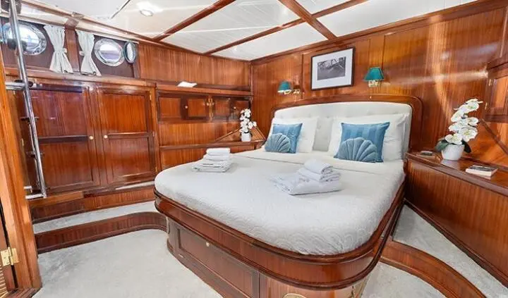 Smart Spirit yacht master cabin with king bed, ensuite, wood paneling