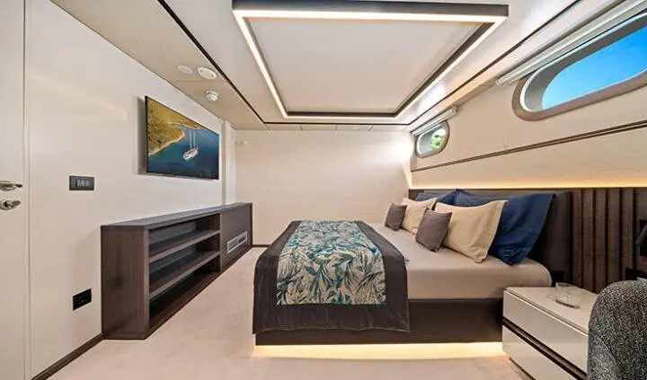 Master cabin with king bed, ensuite, neutral tones, built-in storage, ceiling lighting