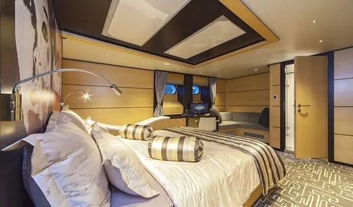 Navilux cabin bed with patterned cushions and wood-paneled interior