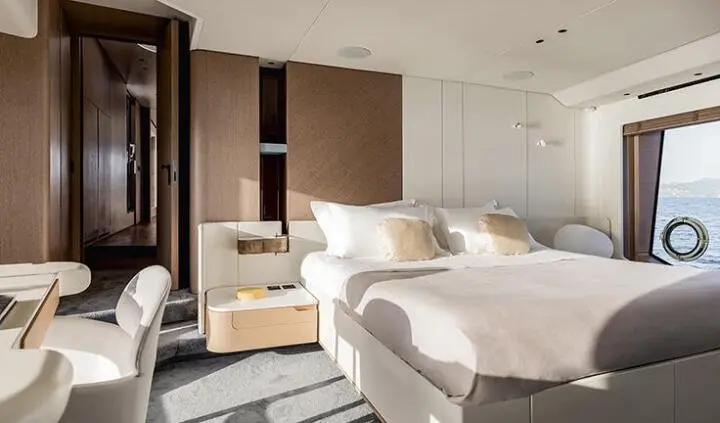 Master cabin with king bed, ensuite, neutral tones, bedside lamps