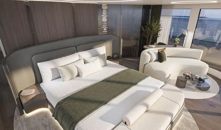 Master cabin with king bed, white linens, brown headboard, ensuite door