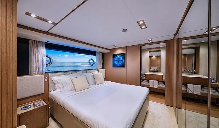 Spica master cabin with king bed and ensuite, port window view