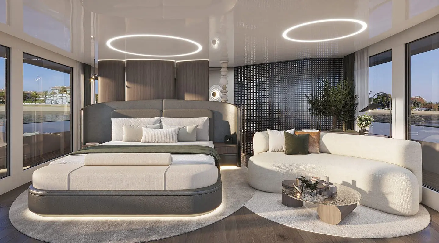 Bello yacht interior with luxury bed, seating area, and ambient lighting