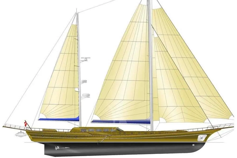 Side profile of a luxury sailing yacht with tall masts and sails