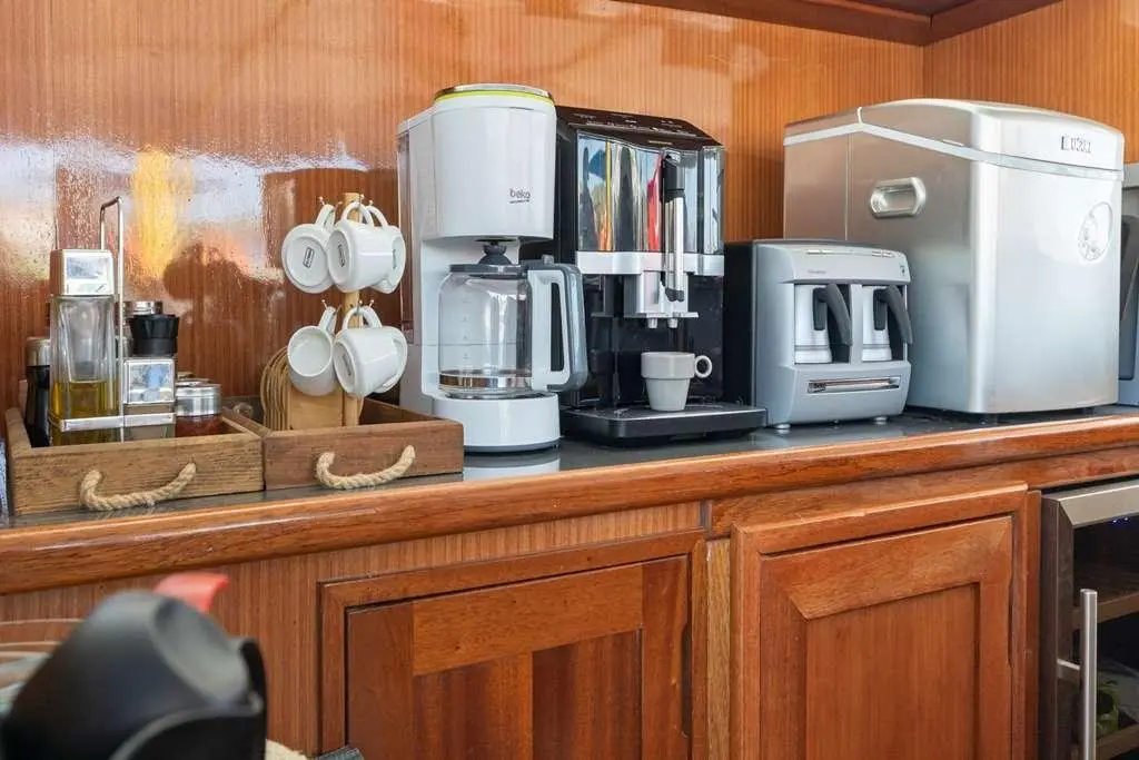 Bar area on Bodrum Queen yacht with coffee station and teacups