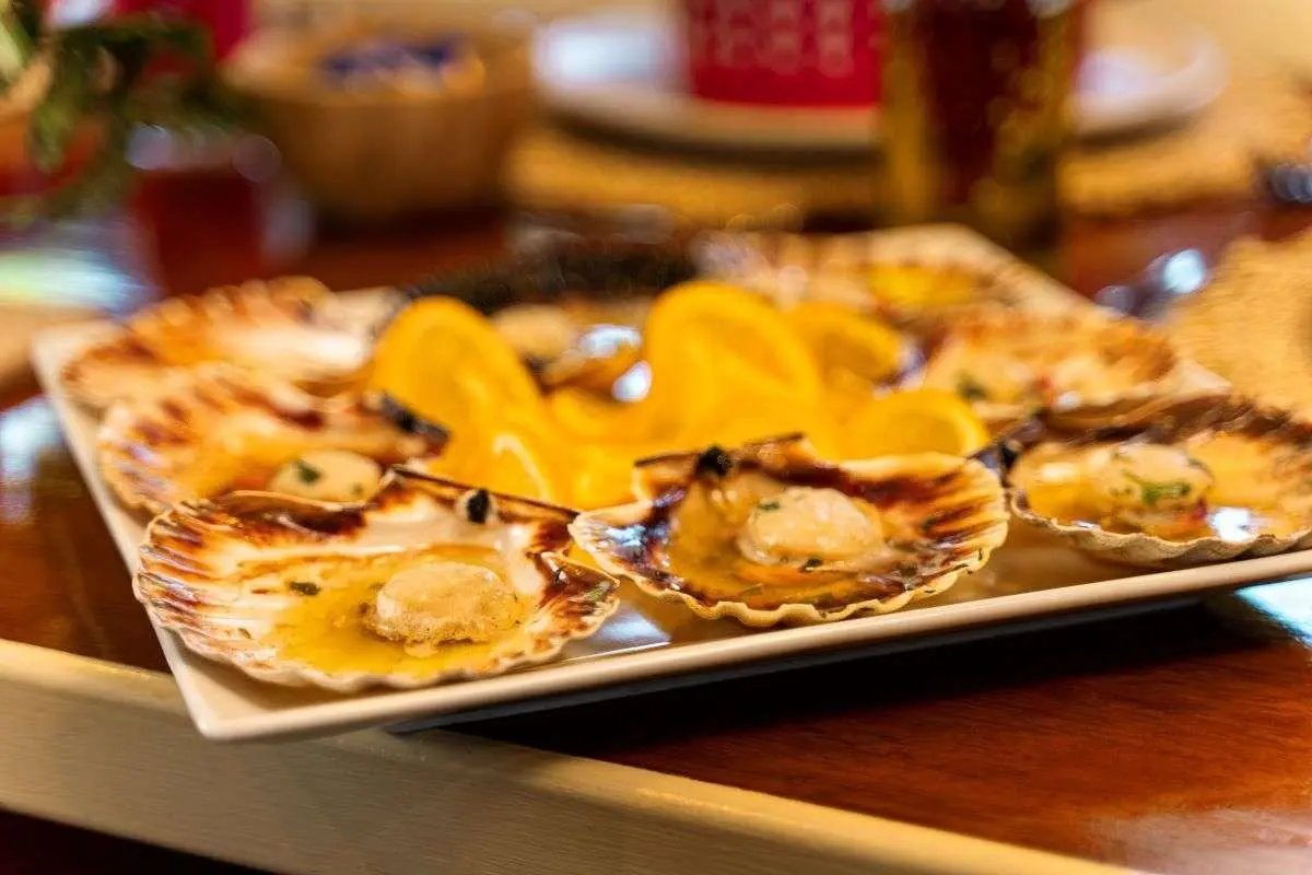 Cesarica yacht charter dining scene with a plate of nachos and toppings