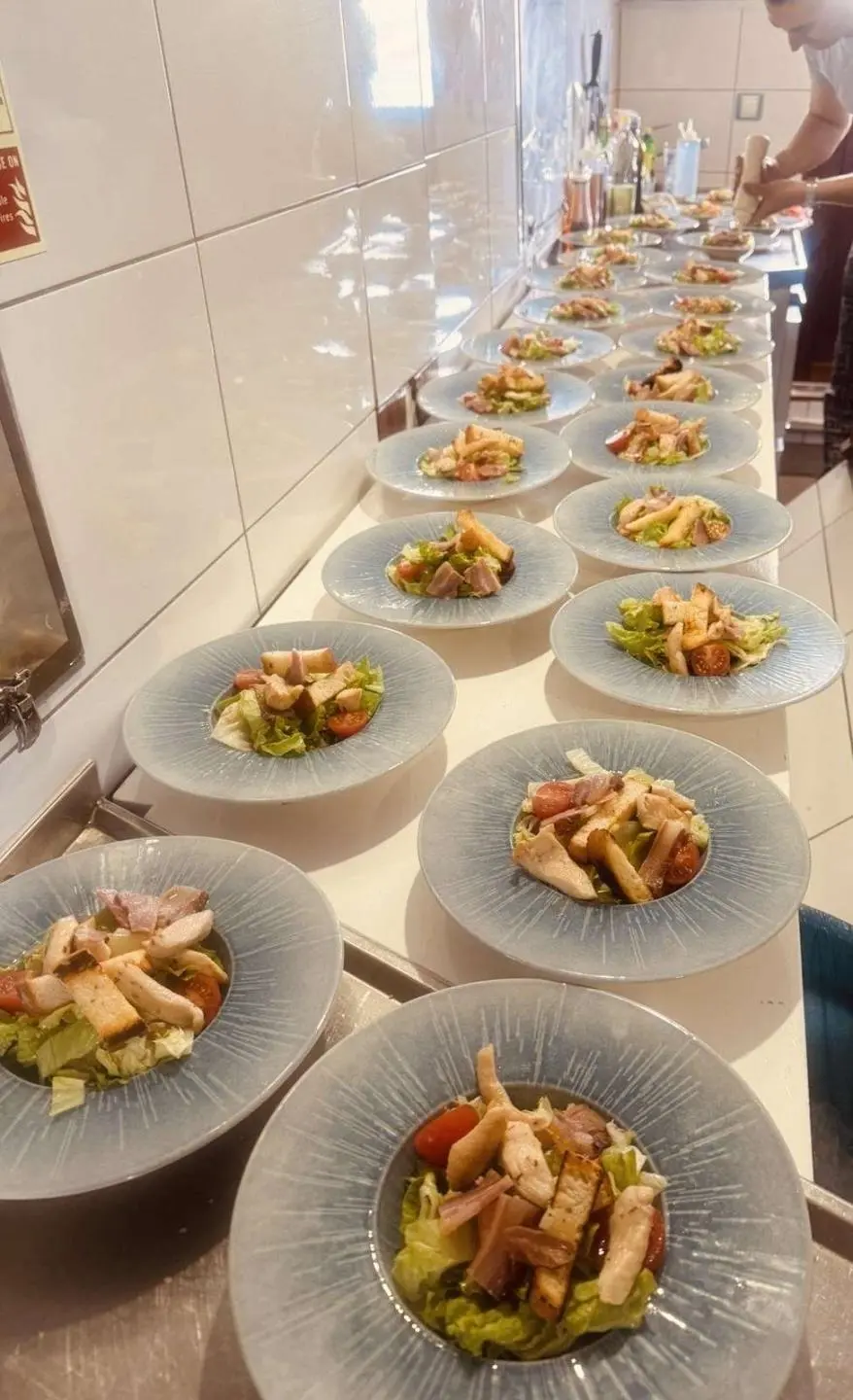 Mendula yacht dining aboard; row of plated appetizers on a table