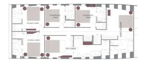 Anetta yacht deck plan with labeled cabins and layout visible on a blueprint