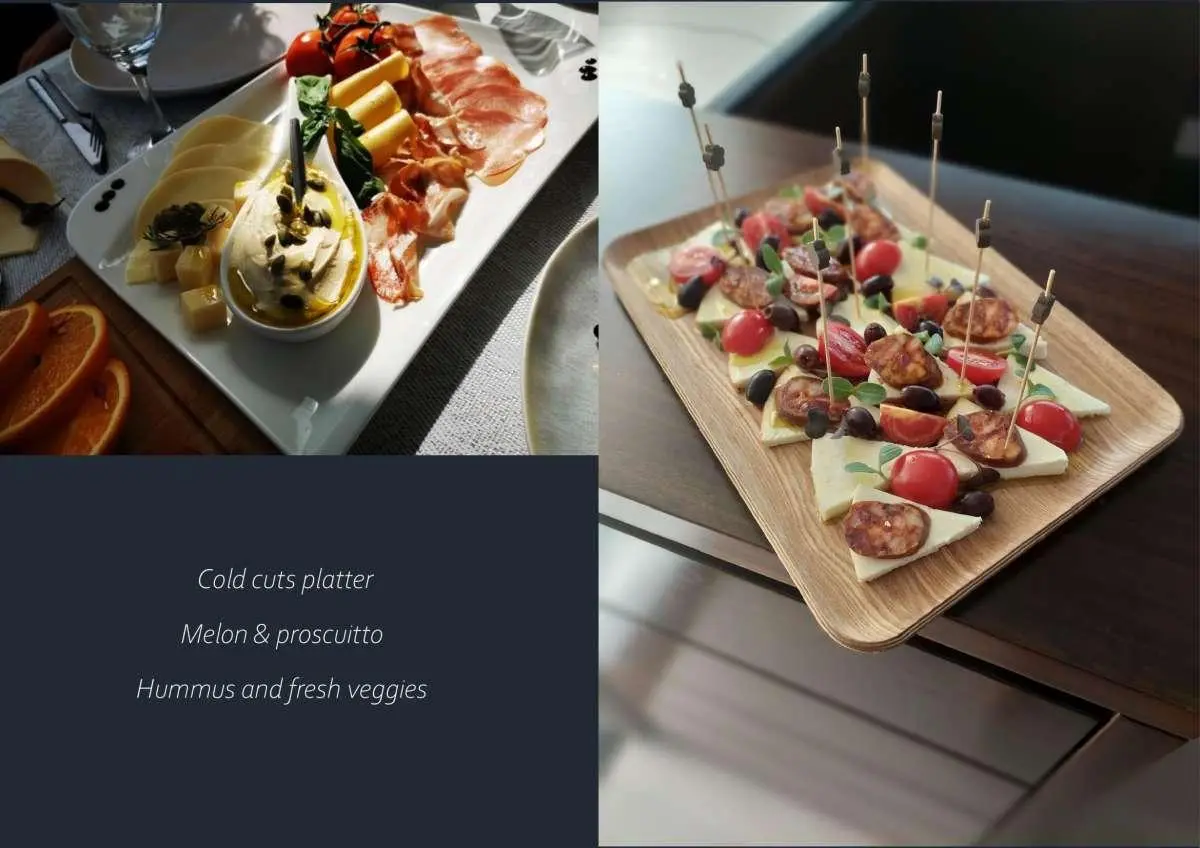 Cold cuts platter with melon, prosciutto, hummus and fresh veggies on a yacht tasting menu