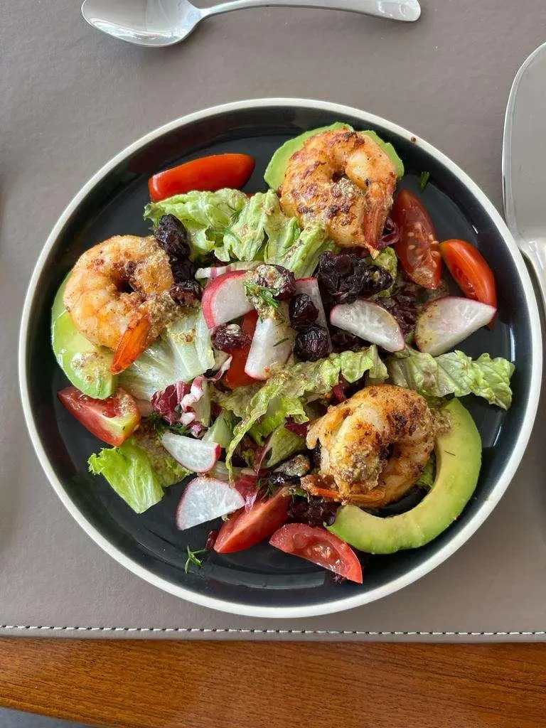 Just Marie 2 yacht charter sample menu dish plated with greens and vegetables