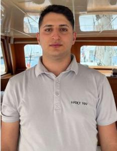 Crew Member Light Grey Polo Yacht Cabin