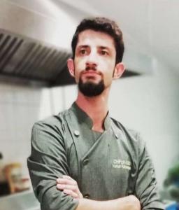 Chef In Kitchen Arms Crossed