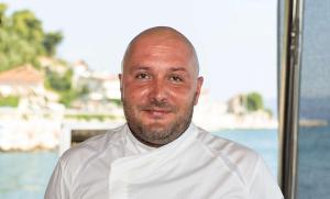 Smiling Crew Member Chef Jacket Portrait