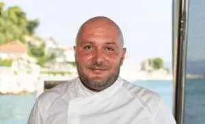 Smiling Crew Member Chef Jacket Portrait