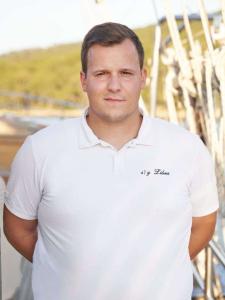 Crew Member On Yacht Deck