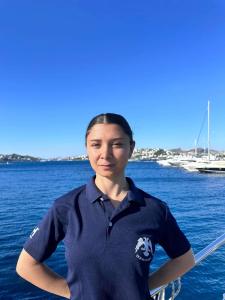 Crew Member On Yacht Rail