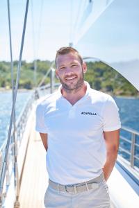Crew Member White Polo Yacht Deck