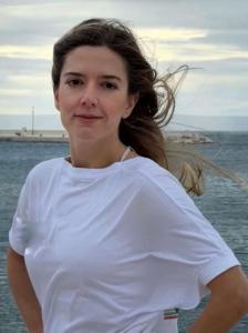 Woman By Sea Wind Blown Hair