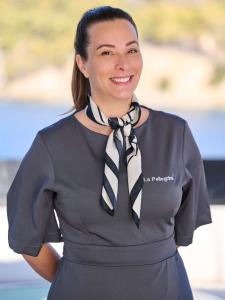 Crew Member Smiling Grey Uniform Striped Scarf