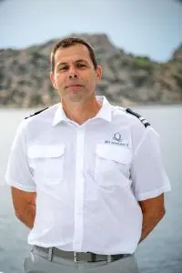 Crew Member White Uniform Coastline Portrait