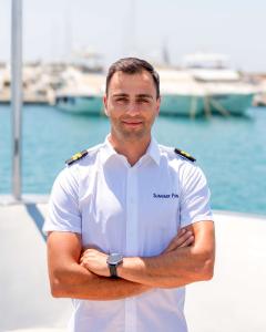 Crew Member White Uniform Dock Yachts