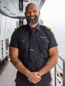 Crew Member On Yacht Deck