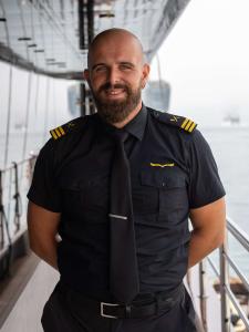 Bearded Crew Member Black Uniform Yacht