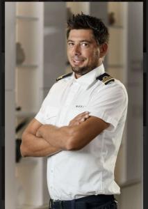 Crew Member Portrait Uniform Arms Crossed