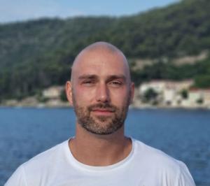 Bearded Bald Man Coastal Hills Water