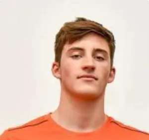Young Man Orange Shirt Portrait