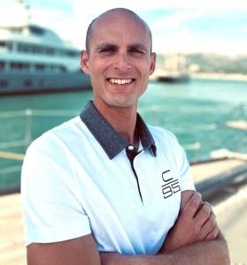 Crew Member White Polo On Deck