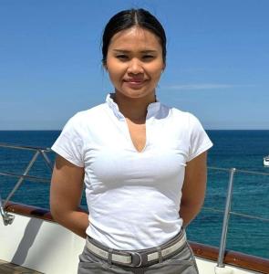 Crew Member On Yacht Deck Sea Background