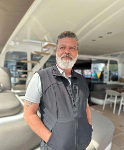 Crew Member On Yacht Deck