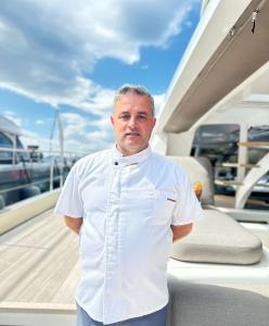Crew Member On Yacht Deck