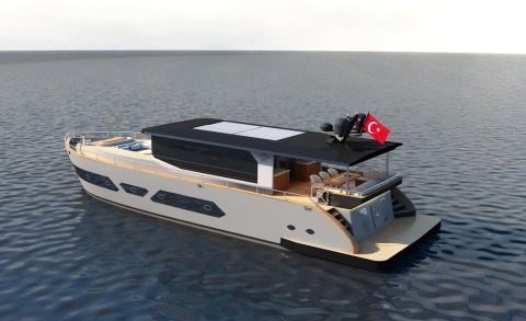 A motor yacht with an open upper deck, black roof and white hull, wooden deck details, and a Turkish flag at the rear