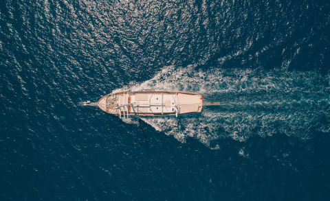 Luxurious sailing gulet viewed from above sailing on open sea
