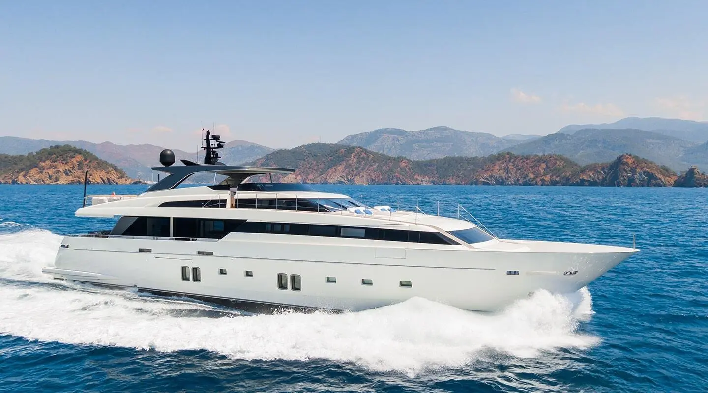 Morning Star motor yacht cruising on blue water with passengers on deck