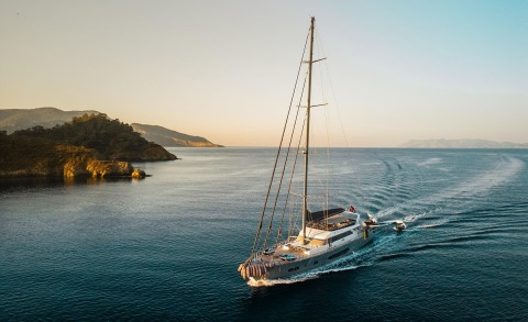 Luxury sailing yacht North Wind seen from above gliding through open sea