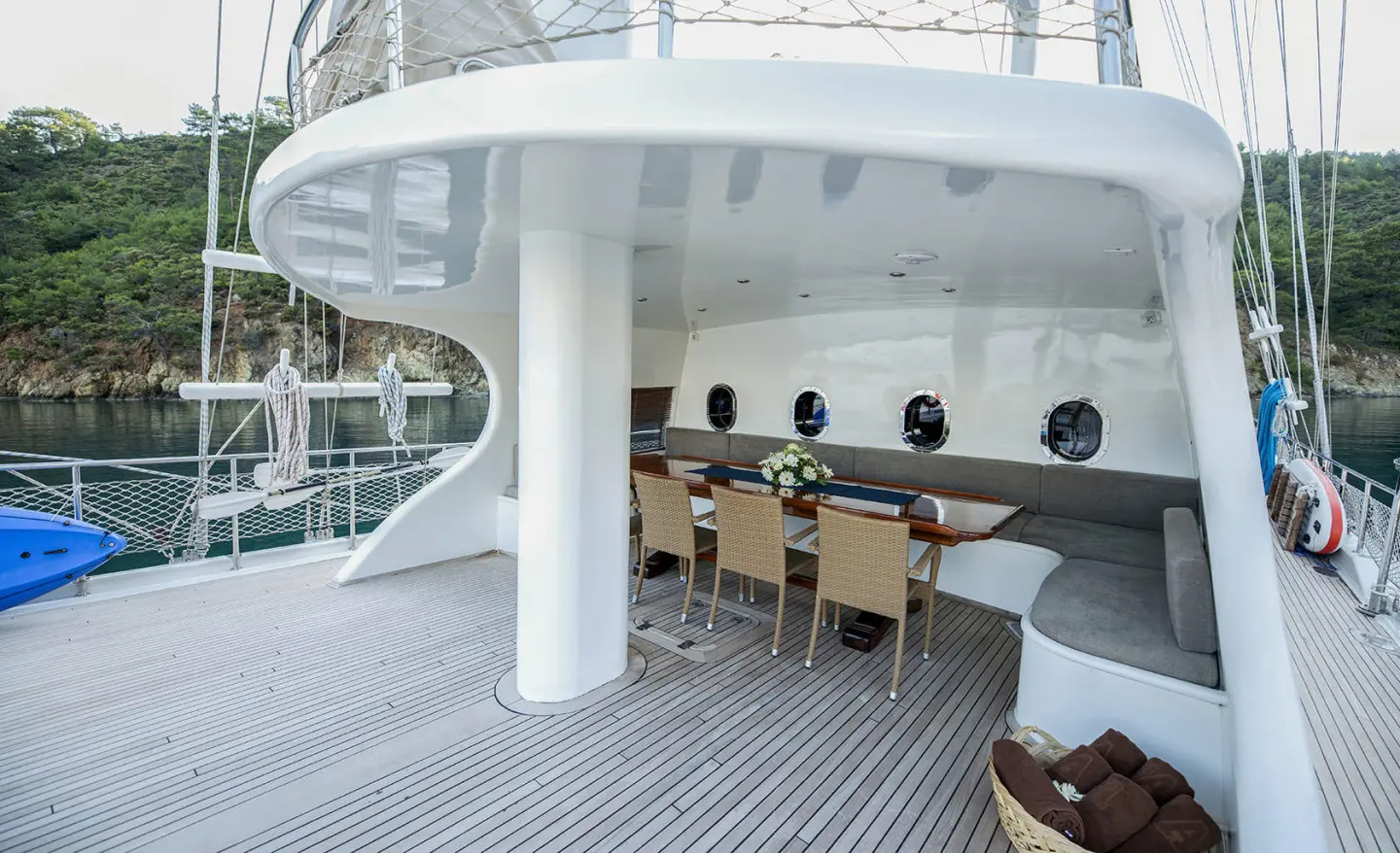 Kayhan 4 luxury gulet sailing yacht at sunset with shaded deck dining area