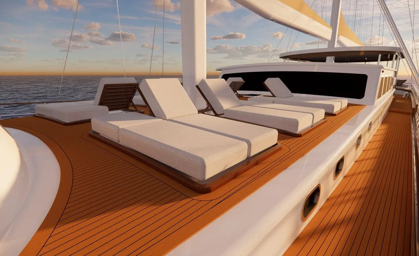 Tosca yacht sun loungers on teak deck at sea during sunset