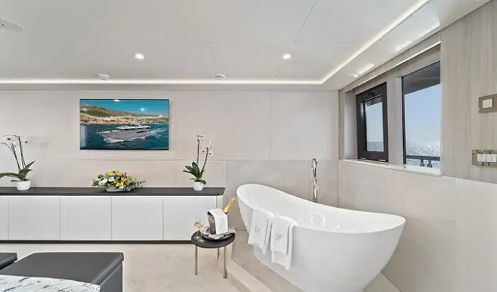 Master cabin with king bed, ensuite, on Freedom yacht, bright window view
