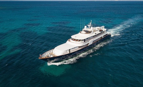 A white luxury Wind Of Fortune yacht cruising azure Mediterranean waters