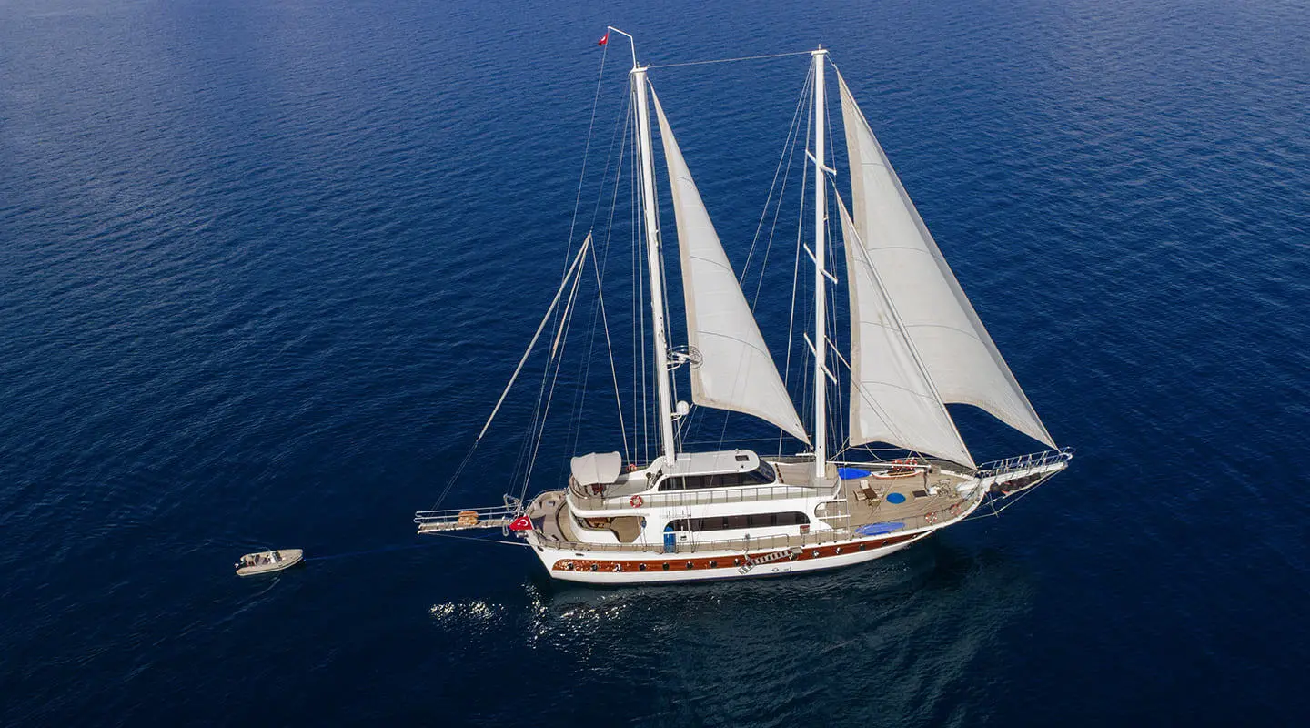 Kayhan 4 sailing yacht with two masts on calm deep blue sea
