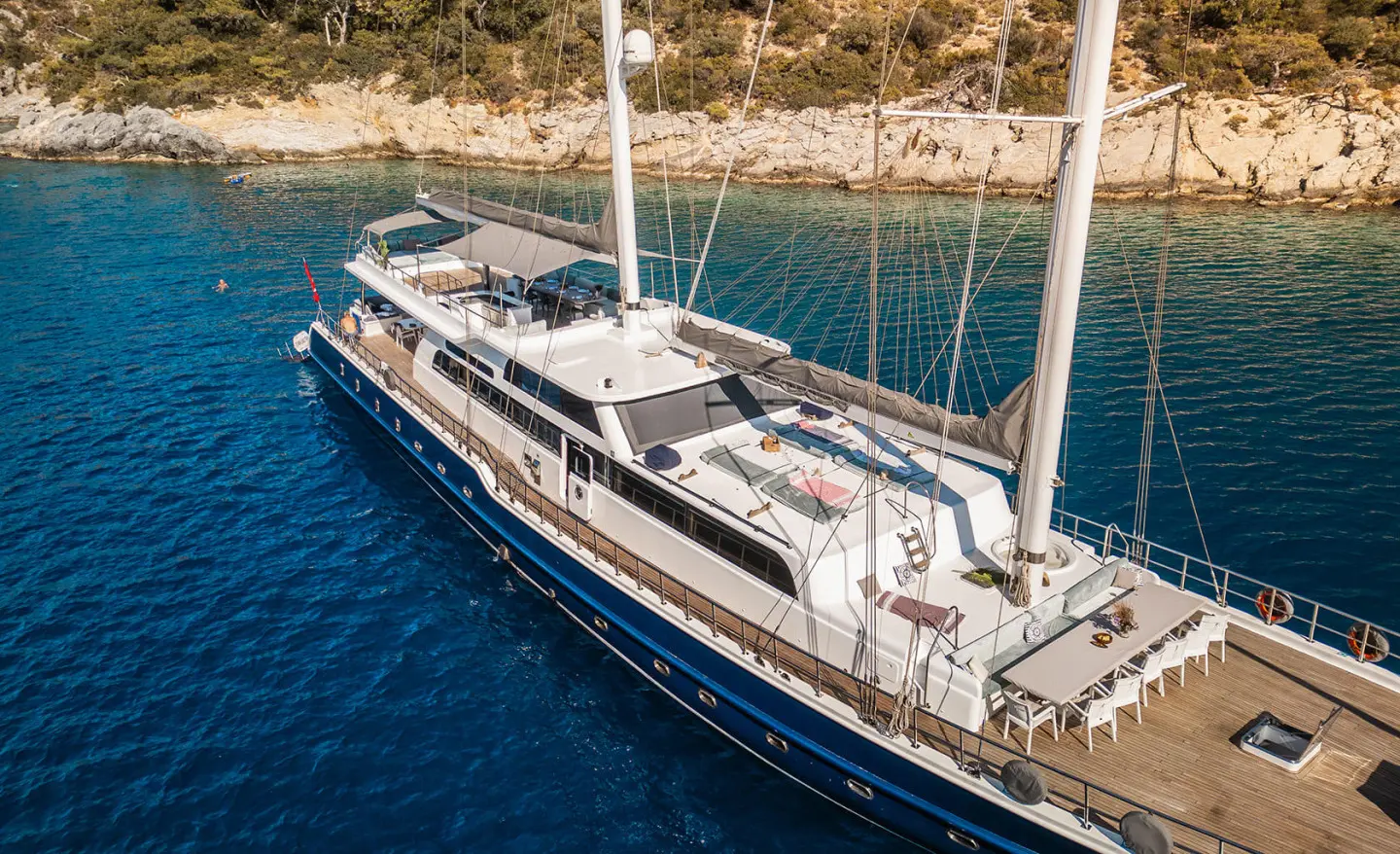 Esma Sultan luxury gulet sailing at sunset with deck seating and masts