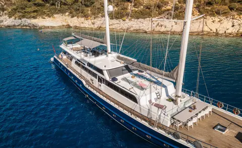 Esma Sultan luxury gulet sailing at sunset with deck seating and masts
