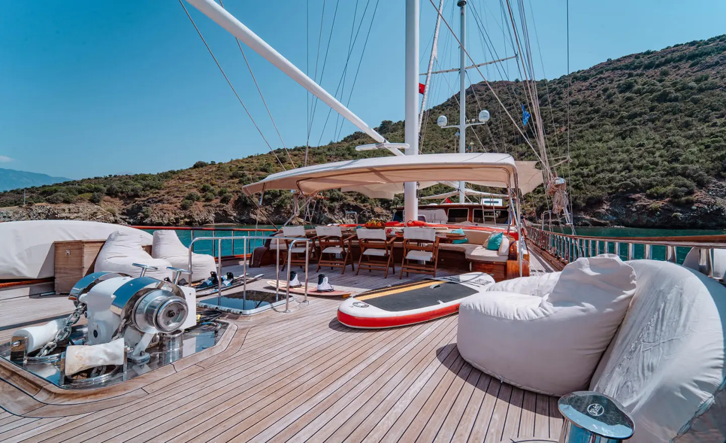 Lycian Queen yacht at sunset docked with blue sky and calm sea backdrop